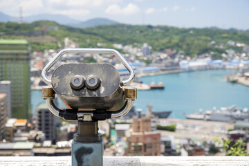 Tourist binocular view of the city in Keelung of Taiwan