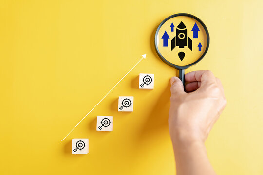 Business growth success achievement concept, hand of people arranging as step stair or ladder rocketship launch for planning development leadership and customer target group concept.