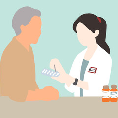 Obraz premium A pharmacist is giving medication to an elderly person.