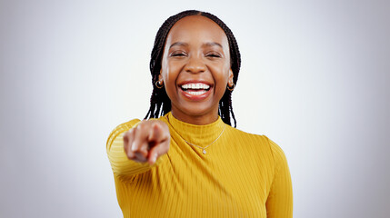 Happy, portrait and black woman with hand pointing at you in studio for choice, vote or decision on...