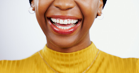 Teeth whitening, smile and closeup of black woman and mouth, lips or happiness in studio white...