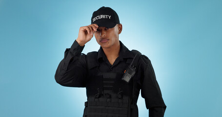 Security guard, confidence and man or employee in a studio with police and law enforcement. Blue...