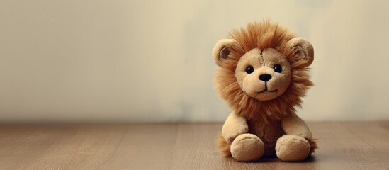Fototapeta premium Tiny lion toy for your mobile photos