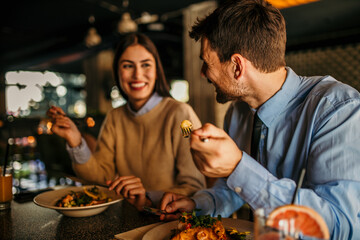 A man and a woman enjoying a casual lunch date