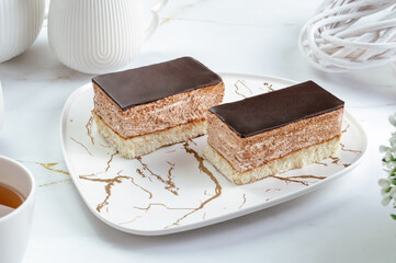 layered delicate mousse cake with chocolate