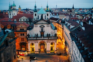 Obraz premium Winter twilight in Prague, snow, panoramic view of the city center