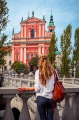 Rear view of woman visiting Ljubljana, capital city of Slovenia