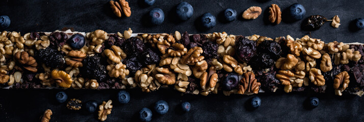 Muesli Bars with fresh Blueberries on wooden background. zesty blueberry granola bars.