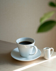 コーヒーカップと葉っぱ