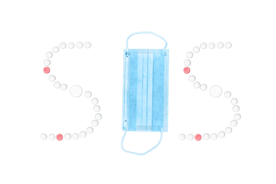 Text sos made from pills and medical mask, isolated on a white background. Concept of coronavirus problems, lockdown and quarantine due to the pandemic