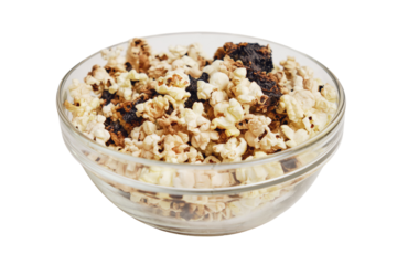 Burnt popcorn from a home microwave. Burn corn kernels on the kitchen table, isolated on white background