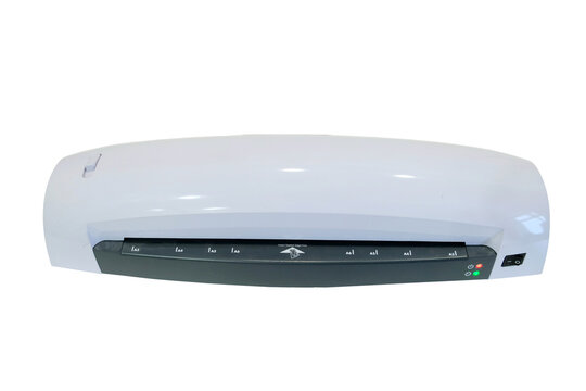 The plastic lamination machine spoils the document, isolated on white background. The desktop laminator highlights the ultrasound result