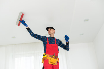 Construction worker installation ceiling work