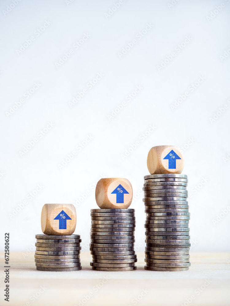 Poster blue arrow with percentage icons on wooden cube blocks on business coin stack growth graph steps on 