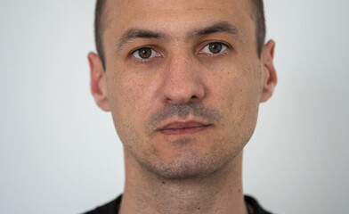 Fototapeta premium Portrait of a young man, isolated on background