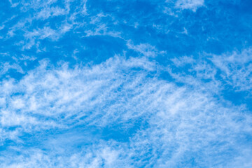Blue sky with beautiful thin spindrift clouds. Background.