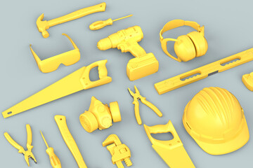 Top view of monochrome construction tools for repair on grey background