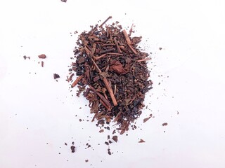 Tea dregs isolated on white gray background. tea leaves. Top view
