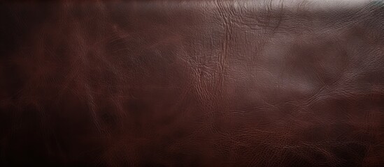 Texture of leather in a deep shade of brown