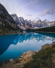Fototapeta na wymiar Lake moraine in the morning, a quiet place with a serene, light and noiseless atmosphere. Alberta, Canada
