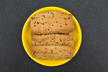 Salt Black cumin cookies in a plate top view 