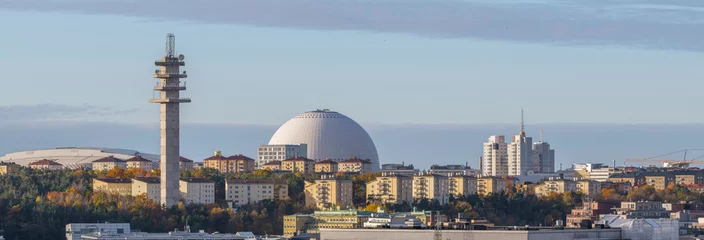 Photo sur Plexiglas Stockholm The district Hammarby and the arena globe Avicii, grey sky back ground and low morning sun light, early autumn morning in Stockholm