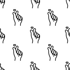 Mini Heart Hand Gesture seamless pattern background.