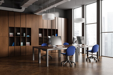 Wooden coworking room interior with pc desktop on table, shelf with window