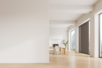 Cozy workspace interior with pc desktop on table in row, window. Mock up wall