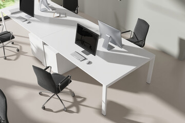 Top view of office workplace interior with pc desktop and armchairs - obrazy, fototapety, plakaty