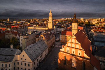 Fototapeta na wymiar The old town in Opole during autumn sunset. Beautiful contrasting light set the mood for this view.