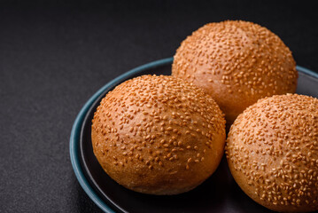 Delicious fresh crispy white round bread with seeds and grains