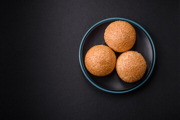 Delicious fresh crispy white round bread with seeds and grains