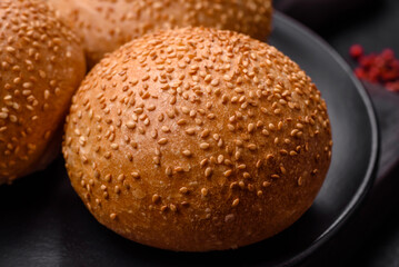 Delicious fresh crispy white round bread with seeds and grains