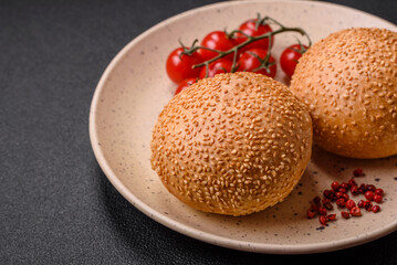 Delicious fresh crispy white round bread with seeds and grains
