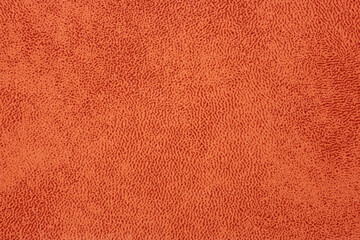 Orange leather a background or texture
