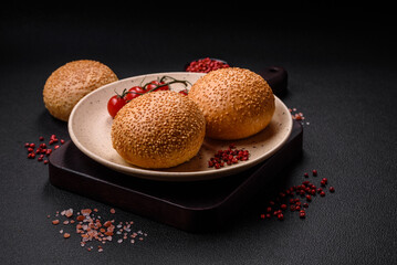 Delicious fresh crispy white round bread with seeds and grains