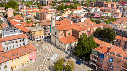 Fototapeta na wymiar Aerial view of the parish church of San Remigio in Vimodrone, in the metropolitan city and archdiocese of Milan, Italy. This Catholic place of worship is part of the deanery of Cologno Monzese.
