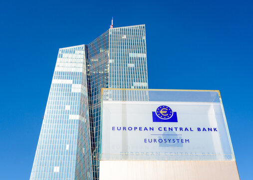 Frankfurt am Main, Germany - August 20, 2023: Low angle view of the sign and logo of the European Central Bank at the southern entrance of the Skytower building, headquarters of the ECB since 2015.