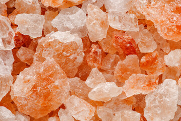 Pink salt, in bulk, crystals close-up, background, full depth of field