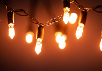 Bright string lights, no colors, warm and festive