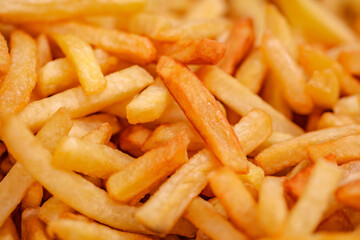 French fries potato, in bulk, close-up, selective focus