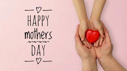 Heart banner in hands of daughter and mother on pink background for greeting card with Happy Mother's Day concept