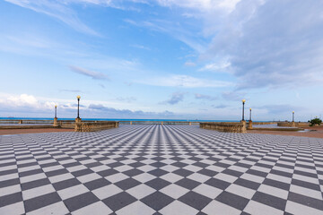 Livorno, Italy. Famous Mascagni Terrace - Terrazza Mascagni - with chess geometry pattern pavement - obrazy, fototapety, plakaty