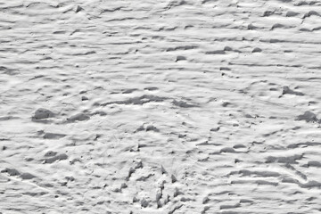 Surface of wooden board painted with white paint rough, background close-up