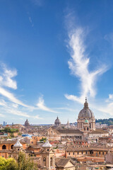 Fototapeta na wymiar Rome, Italy. Urban landscape, blue sky with clouds, church exterior architecture