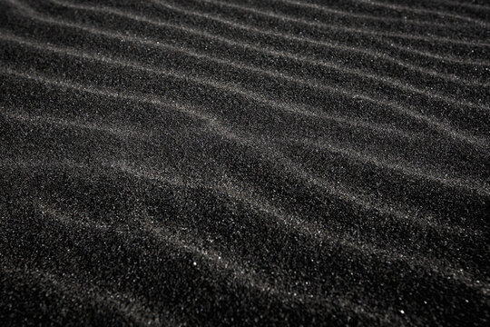 Detail of black sand beach on Iceland.