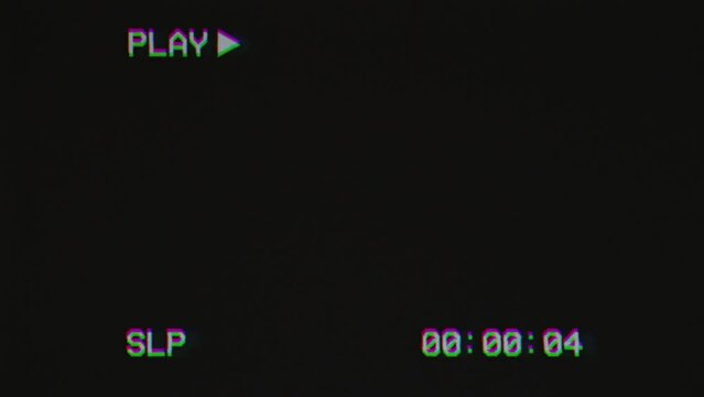 Effect of Glitch TV on black background with text 'PLAY' and timecode. Videocassette recorder. Retro, vintage 80s style animation. Damaged cassette type.