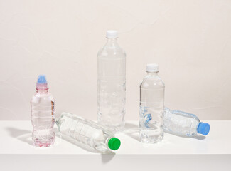 Plastic bottles with clean drinking water. Thirst and the lack of clean water.
