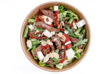 Salad with veal and tofu on a white background, for a food delivery site 3